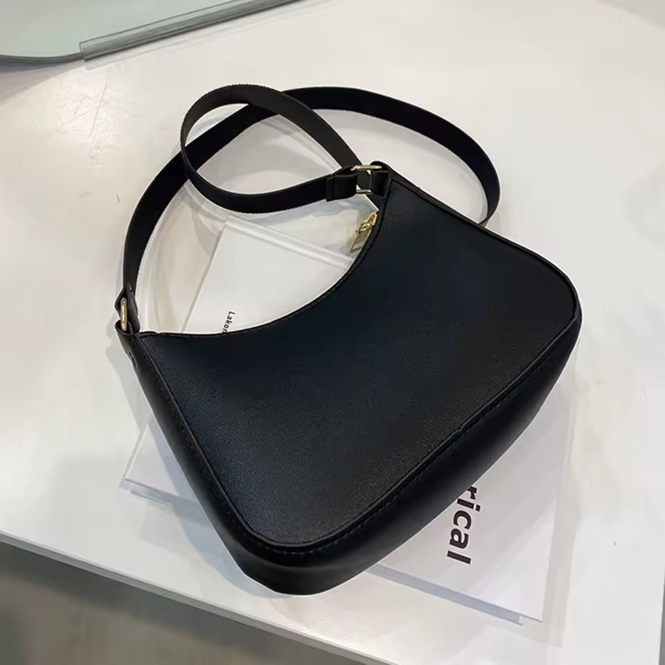BELÉN - CARTERA DE CUERO CON CORREA AJUSTABLE