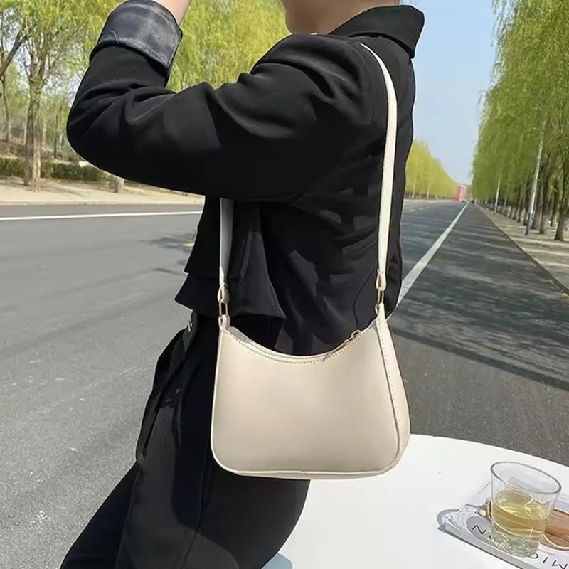 BELÉN - CARTERA DE CUERO CON CORREA AJUSTABLE